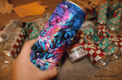 Person Holding Can With A GIF