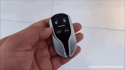 Person Holding Car Key Fob Youtube.com/namastecar GIF