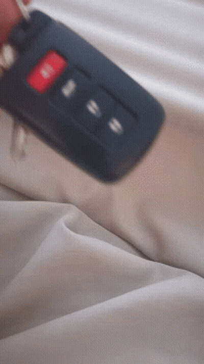 Person Holding Car Key Saying Unlock GIF