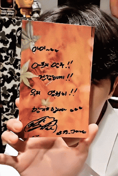 Person Holding Card Saying I Love You GIF
