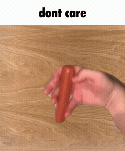 Person Holding Carrot Saying Dont Care GIF