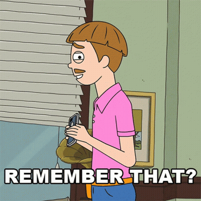 Person Holding Cat In Front Of J + J Wall GIF