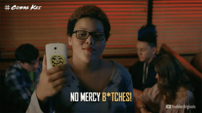 Person Holding Cell Phone Saying No Mercy B*tches GIF