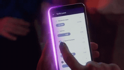 Person Holding Cellphone With Purple Light GIF