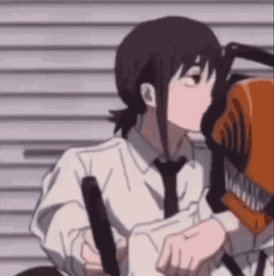 Person Holding Chainsaw Close Up GIF