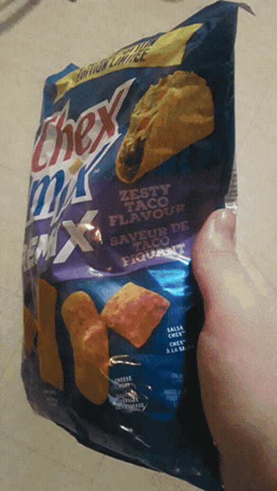 Person Holding Chex Mix Taco Flavour Chips GIF