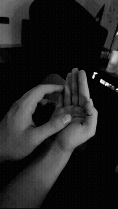 Person Holding Child's Hand Black And White GIF