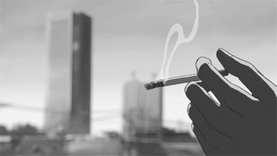 Person Holding Cigarette In City GIF