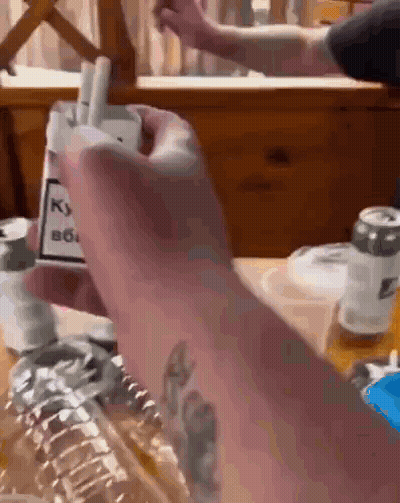 Person Holding Cigarettes