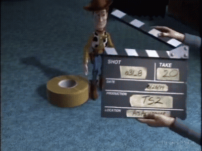 Person Holding Clapper Board Saying Shot And Take GIF