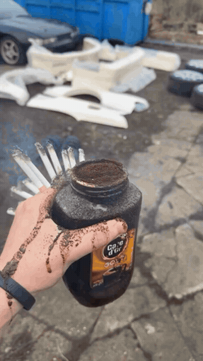 Person Holding Coke D'Ice Bottle GIF