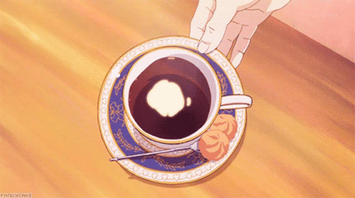 Person Holding Cup Of Coffee On Saucer GIF