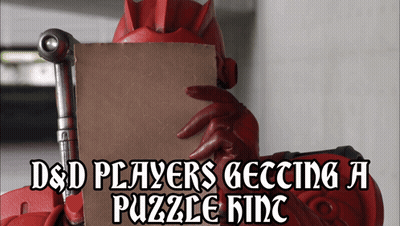 Person Holding D & D Players Getting A Puzzle Rinc Sign GIF