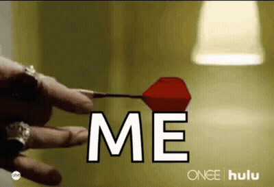 Person Holding Dart Saying Me GIF