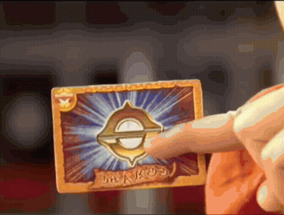 Person Holding Dragon Card GIF