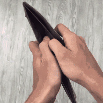 Person Holding Empty Wallet GIF