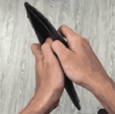 Person Holding Empty Wallet Folding It GIF