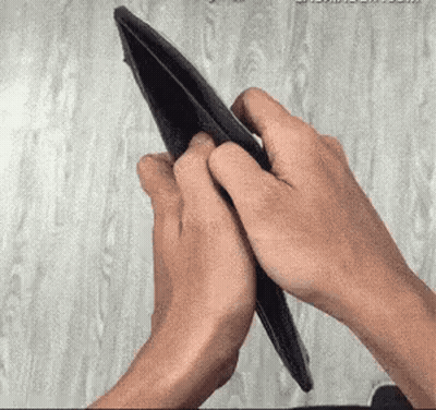 Person Holding Empty Wallet Looking At It GIF