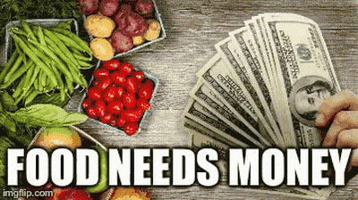 Person Holding Fan Of Money Next To Fruit And Vegetables GIF