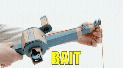 Person Holding Fishing Rod With Bait GIF