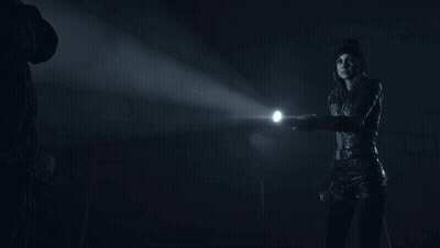Person Holding Flashlight In Dark GIF