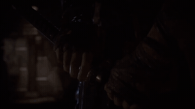 Person Holding Flashlight In Dark Room GIF