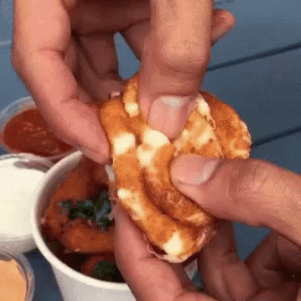 Person Holding Food GIF