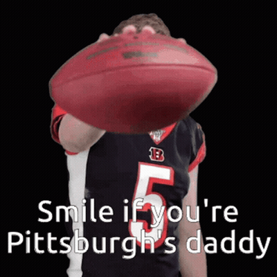 Person Holding Football Saying Smile If You're Pittsburgh's Daddy GIF