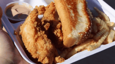Person Holding Fried Chicken And Fries GIF