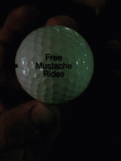 Person Holding Golf Ball With Black Line GIF