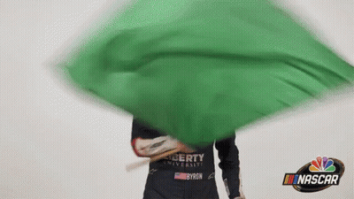 Person Holding Green Flag Saying NASCAR GIF