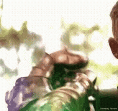 Person Holding Green Object GIF
