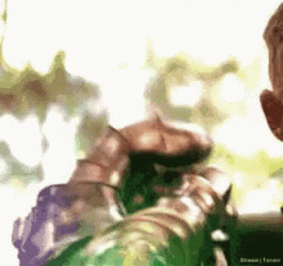 Person Holding Green Object GIF