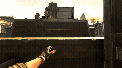 Person Holding Gun At PTV Building GIF