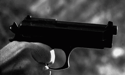Person Holding Gun GIF
