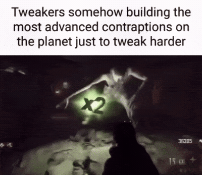Person Holding Gun In Dark Room With Green X2 GIF