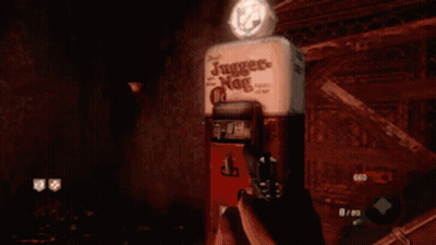 Person Holding Gun In Front Of Juggler Nog Box GIF