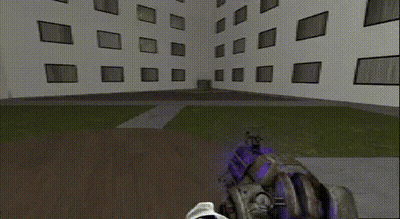 Person Holding Gun In Front Of Large Building GIF