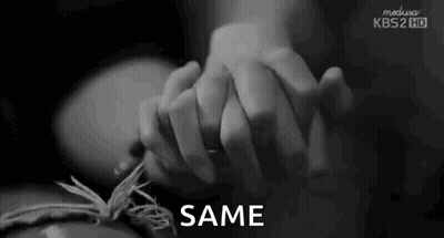 Person Holding Hands With Same Text GIF
