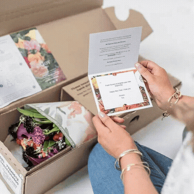 Person Holding Happy New Year I Love You Card GIF