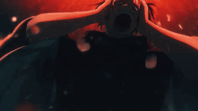 Person Holding Head In Dark Room GIF