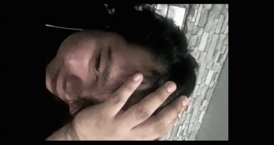 Person Holding Head With Hands GIF
