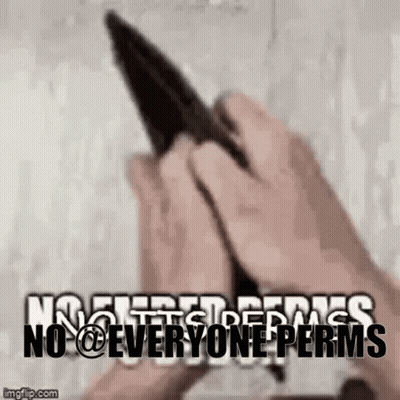 Person Holding Knife In Front Of No Threats Sign GIF