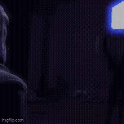 Person Holding Light Saber GIF