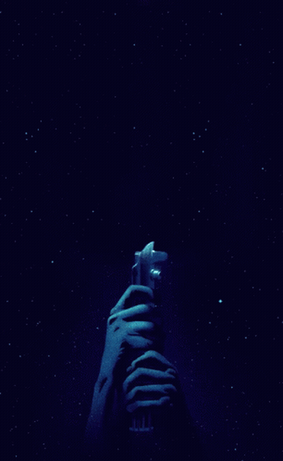 Person Holding Light Saber GIF