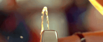 Person Holding Lighter With Water Coming Out GIF