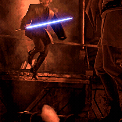 Person Holding Lightsaber In Dark Room With Smoke GIF