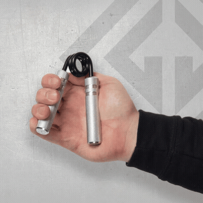 Person Holding Metal Hand Gripper With Black Spring GIF