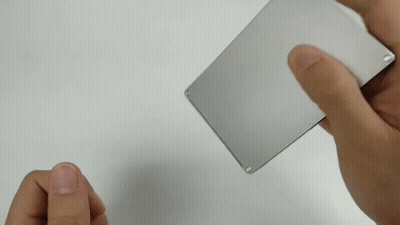 Person Holding Metal Phone GIF