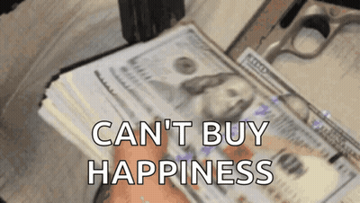 Person Holding Money Can't Buy Happiness GIF
